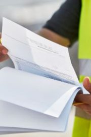 glo-core-person-holding-paperwork